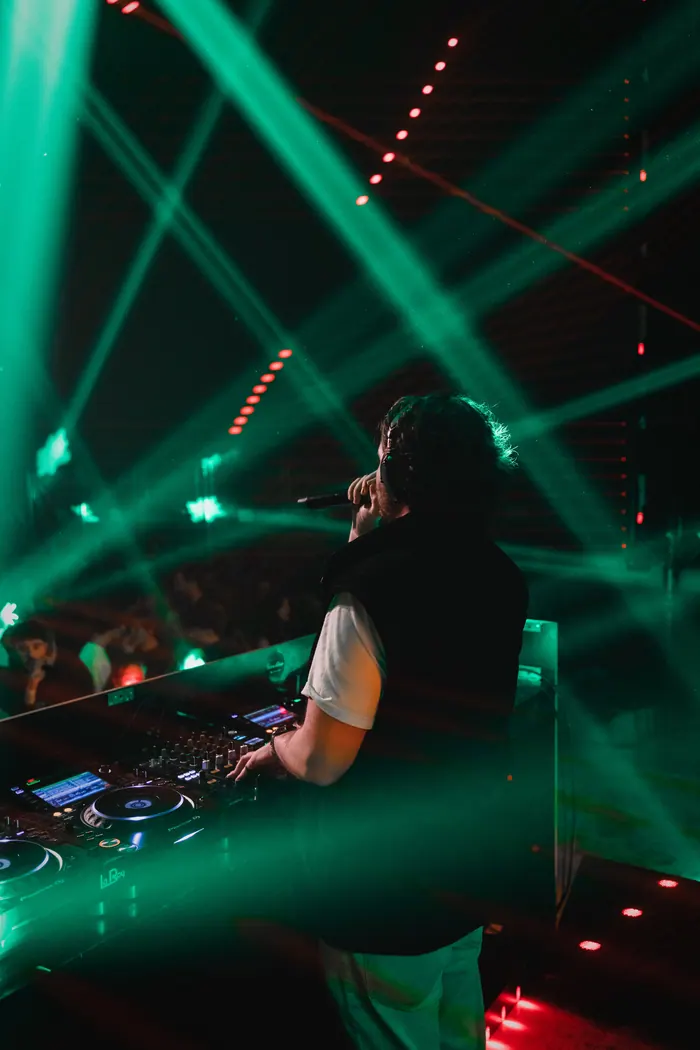 ADIX at the decks under green lasers